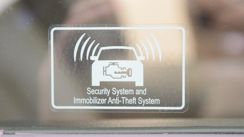 An immobilizer system sticker on a car window