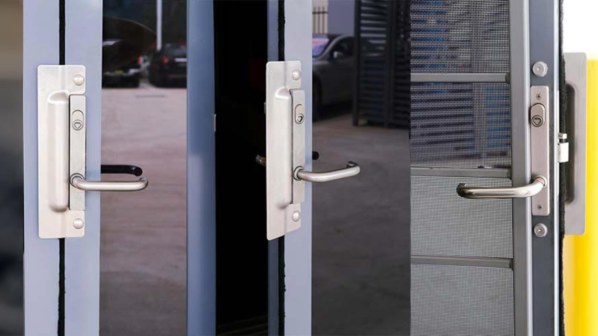 Commercial aluminum glass doors with latch guards